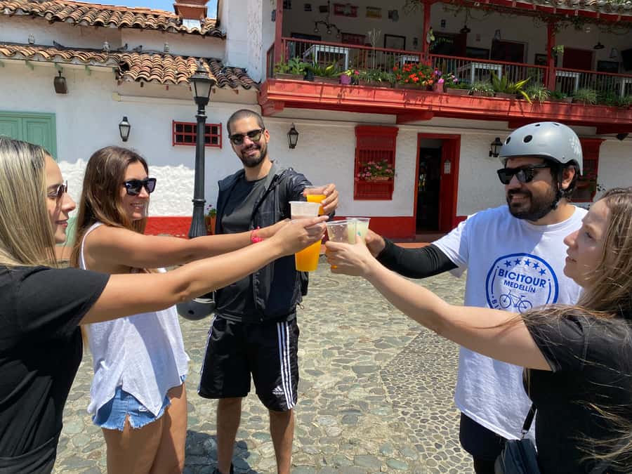E-Bike City Tour Medellin with Local beer and Snacks - Conquistadores: Where the Guide Helps You Read Neighborhood Change