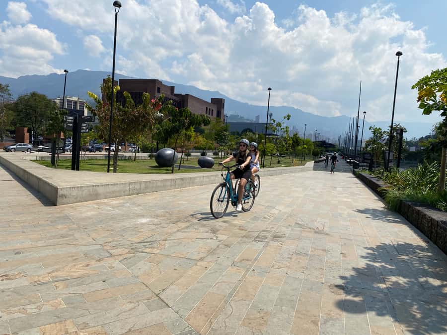 E-Bike City Tour Medellin with Local beer and Snacks - Medellín River Parks: Quiet Green Space on a City Day