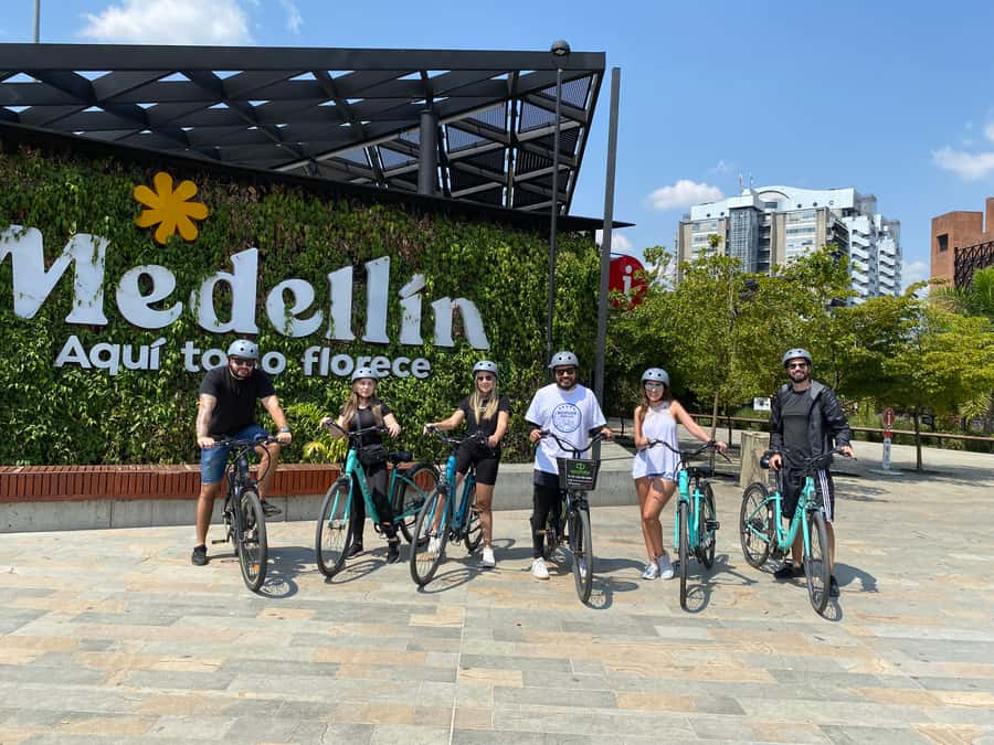 E-Bike City Tour Medellin with Local beer and Snacks - Meeting at San Joaquín Church: Start Where the City Starts Moving