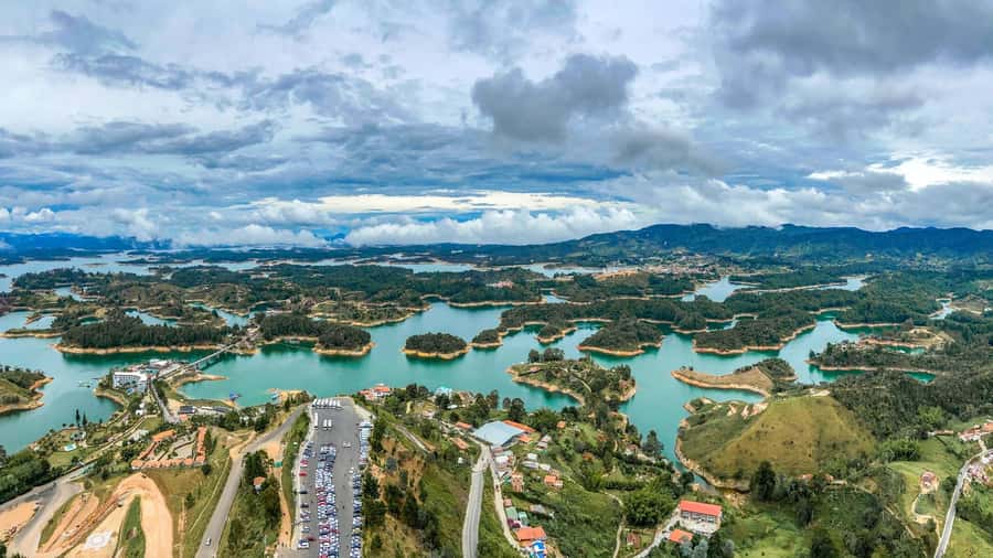 From Medellín: Paragliding Flight and Guatape Tour - Guatape City Tour: Painted Streets, Real Meaning