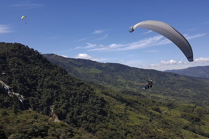Fun RAFTING + Awesome PARAGLIDING over giant waterfalls from MEDELLIN - Key highlights