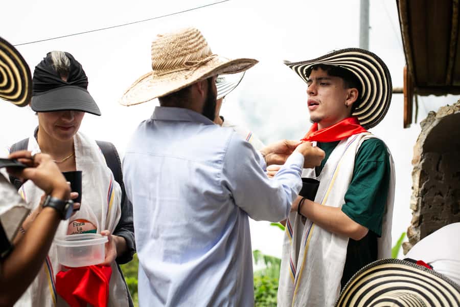 Medellin: Coffee Tour, Horseback Arrival, and Sugar Cane - Guatapé photo stop: colorful town time, with one smart caveat