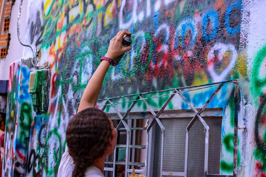 Medellín Comuna 13 local guides snacks and your own graffiti - The escalator project and viewpoint walks: where Medellín shows its teeth and heart