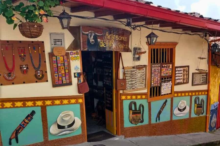 Medellin: Guatape and El Penol Rock Day Trip with Boat Ride - Guatapé town: zócalos, colorful facades, and what to actually notice