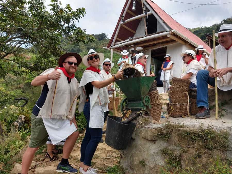 Medellín: Guatape Village with Coffee and Fruit Tasting Tour - El Peñol: the dam story, food tasting, and a quick market stop