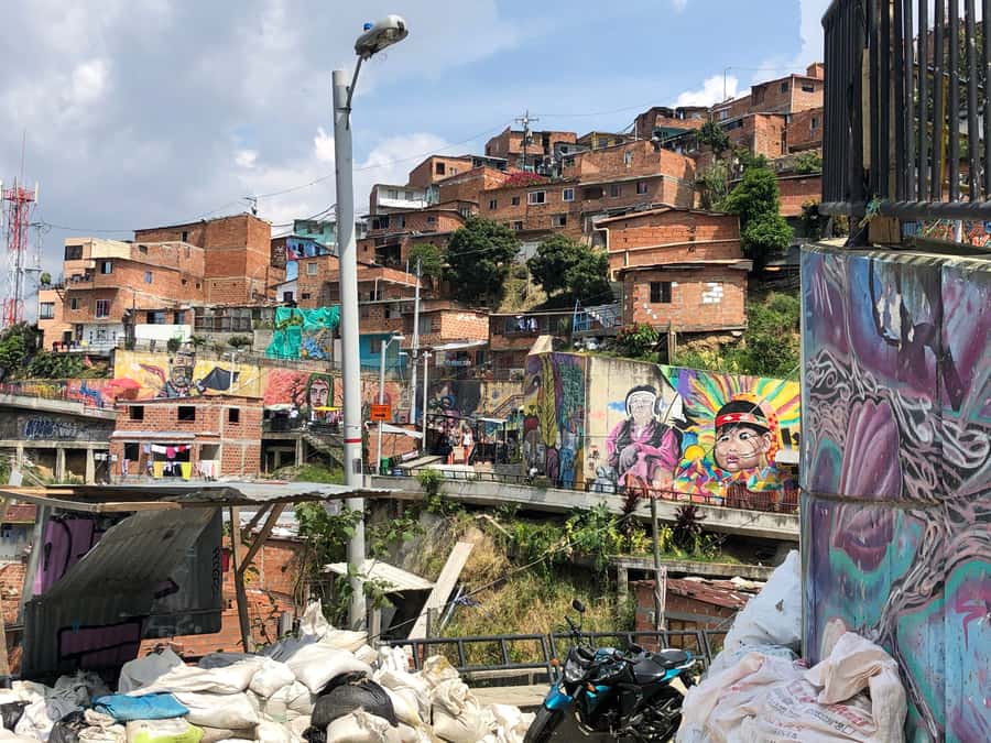 Medellín: Private Comuna 13 Street Art Tour - Arriving in Comuna 13: the murals become a conversation