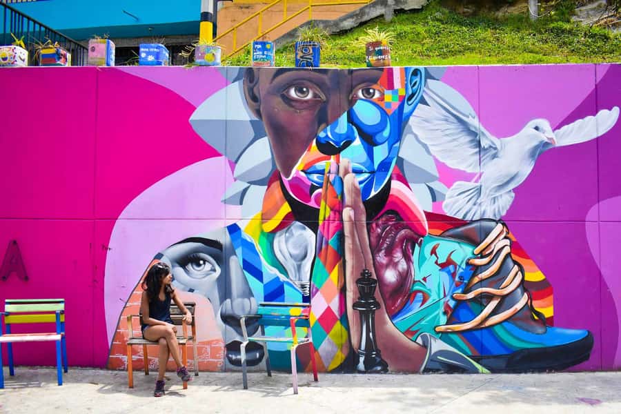 Medellín: Private Comuna 13 Street Art Tour - The Poblado start: noticing graffiti you’d otherwise walk past