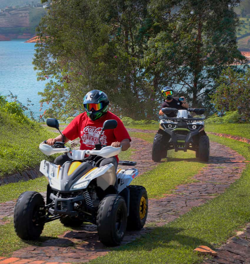 Pablo Escobar Mansion+Paintball+Boat+ATV (Private Guatape) - Guided Guatapé town walk: zócalos, color, and real streets